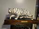 A White Tiger Porcelain Sculpture with Wooden Base, Made in Malaysia, 20 inches
