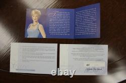 Diana, Princess of Wales doll in short blue dress by Franklin Mint