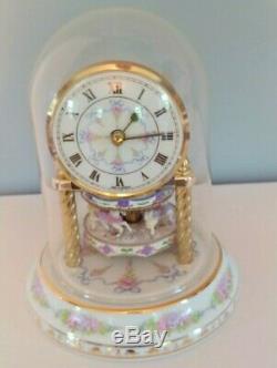 Franklin Mint Anniversary Carousel Clock by William Dentzel III. Porcelain