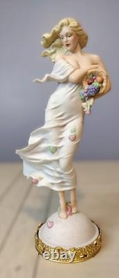 Franklin Mint Earth Figurine 1988. E. Kaufman. Fine Porcelain. Collectible