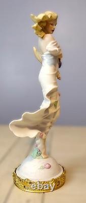 Franklin Mint Earth Figurine 1988. E. Kaufman. Fine Porcelain. Collectible