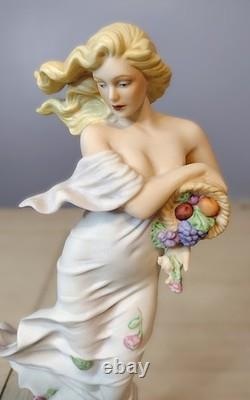 Franklin Mint Earth Figurine 1988. E. Kaufman. Fine Porcelain. Collectible