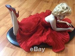 Franklin Mint Marilyn Monroe Porcelain Doll. Red Dress On Velvet Wooden Platform