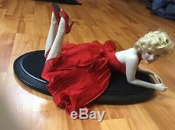 Franklin Mint Marilyn Monroe Porcelain Doll. Red Dress On Velvet Wooden Platform