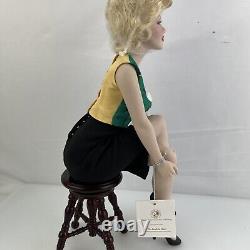 Franklin Mint Marilyn Monroe doll Unforgettable Porcelain sitting On stool 2003