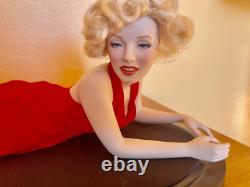 Franklin Mint Porcelain Marilyn Monroe Doll Laying Down in a Red Dress
