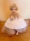 Franklin Mint Porcelain Marilyn Monroe Doll Sitting on a Satin Bench