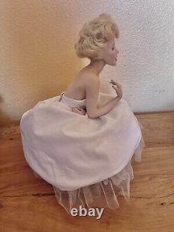 Franklin Mint Porcelain Marilyn Monroe Doll Sitting on a Satin Bench
