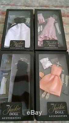Jackie Kennedy porcelain doll with trunk, 13 outfits plus book of authenticity