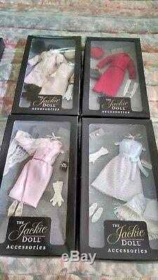 Jackie Kennedy porcelain doll with trunk, 13 outfits plus book of authenticity