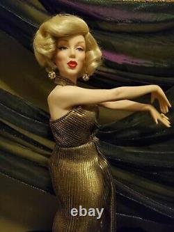 Marilyn Monroe Gold Dress Porcelain Doll from The Franklin Mint with stand