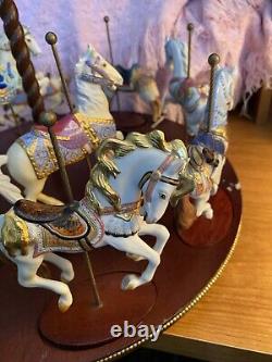 The Treasury Of Carousel Art With 10 Porcelain Figurines On A Wood Base