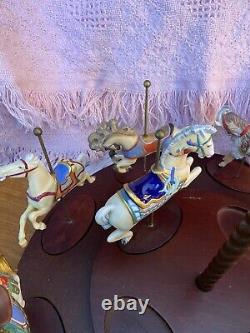 The Treasury Of Carousel Art With 10 Porcelain Figurines On A Wood Base