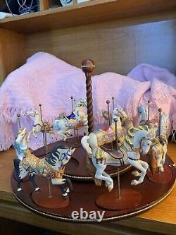 The Treasury Of Carousel Art With 10 Porcelain Figurines On A Wood Base